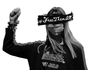 person holding up a fist wearing CPEP shirt with Free Them All written over her face